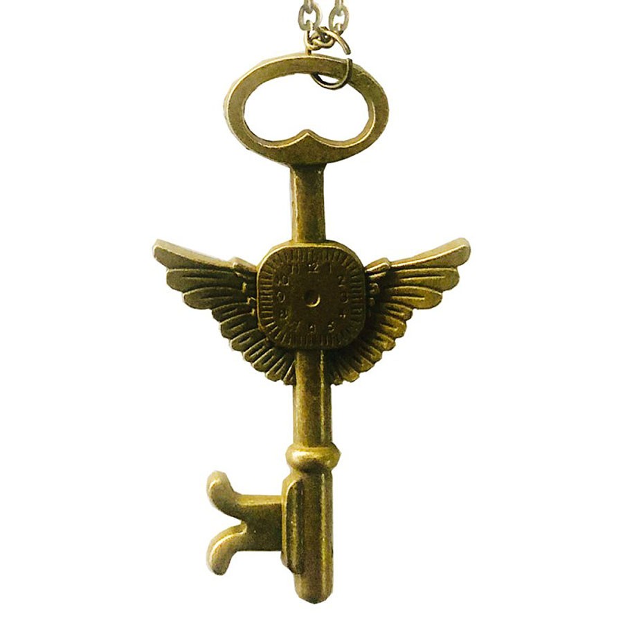Pingente de chave alada, latão antigo