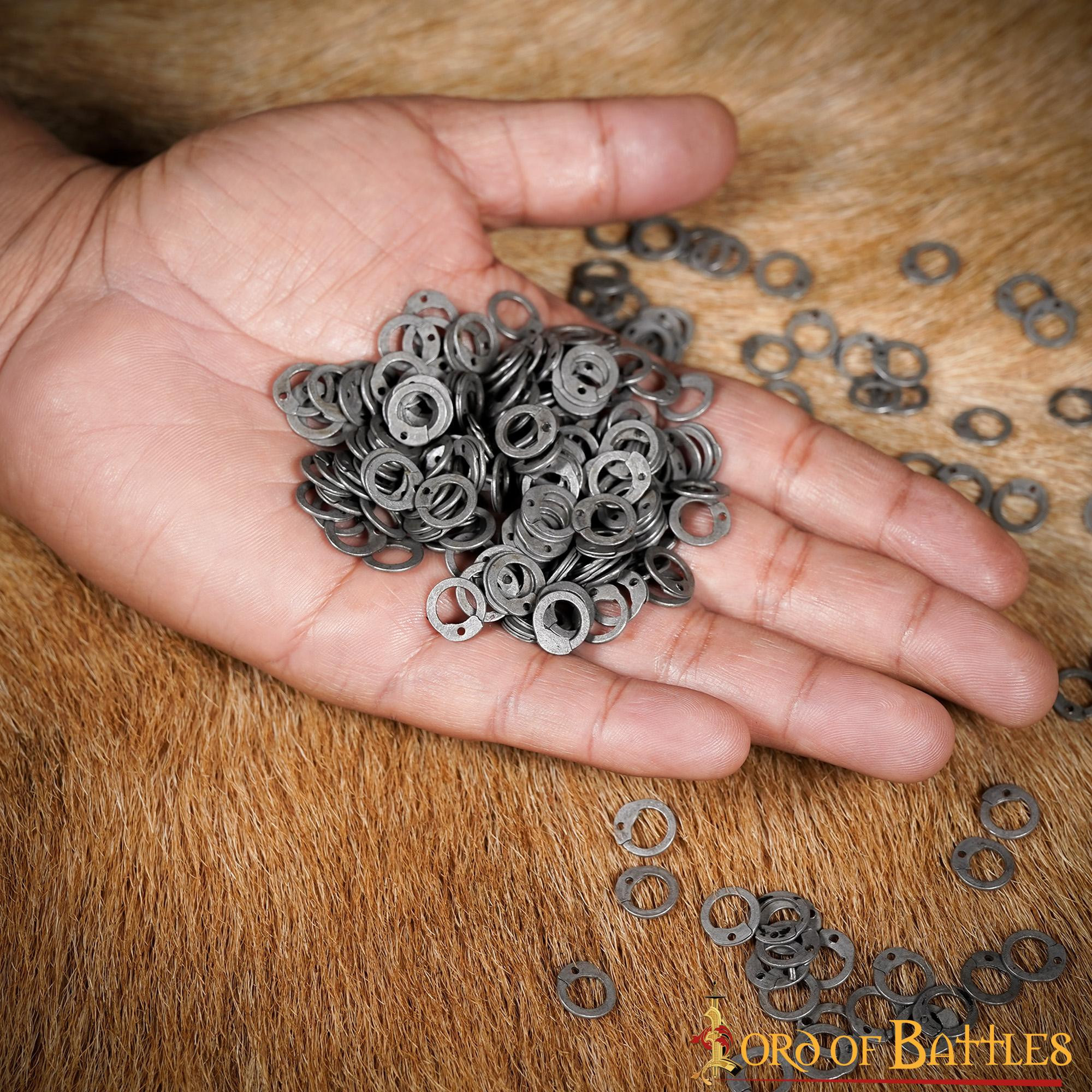 Argolas planas para rebitar cota de malha (1 Kg. aprox.)